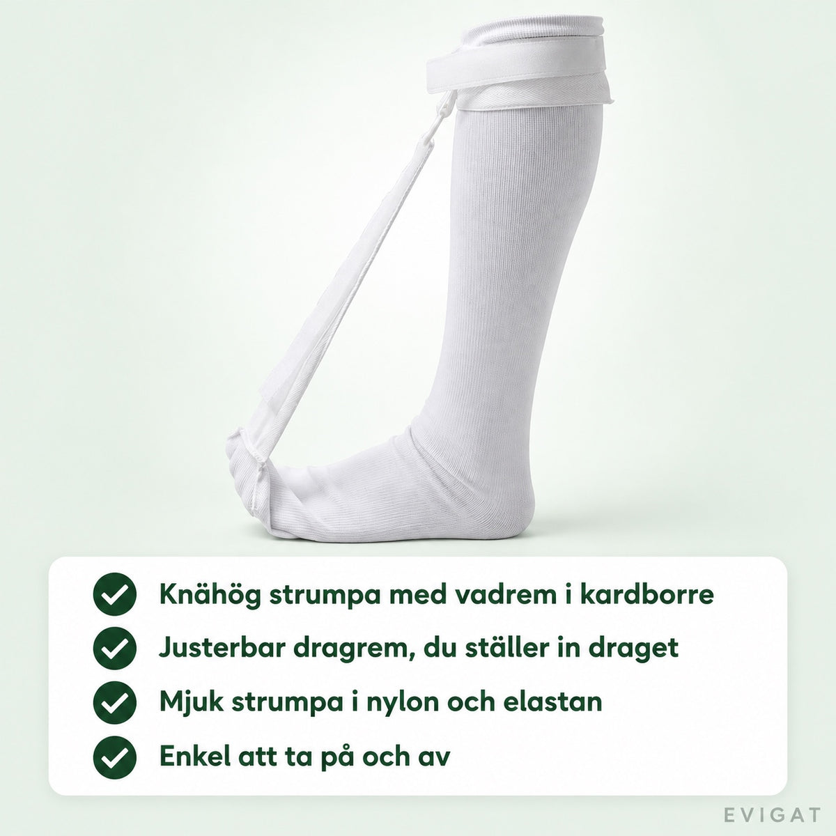 Vit knähög nattstrumpa med vadrem i kardborre och justerbar dragrem, med fyra korta punkter om strumpan