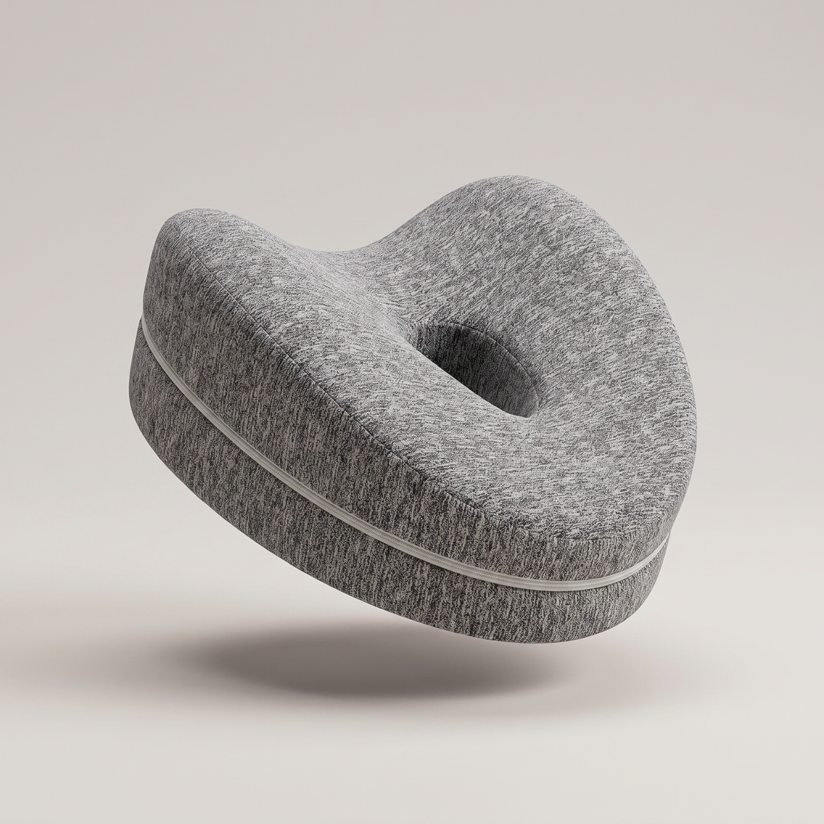 Ergonomisk knäkudde i memory foam med grått stickat överdrag